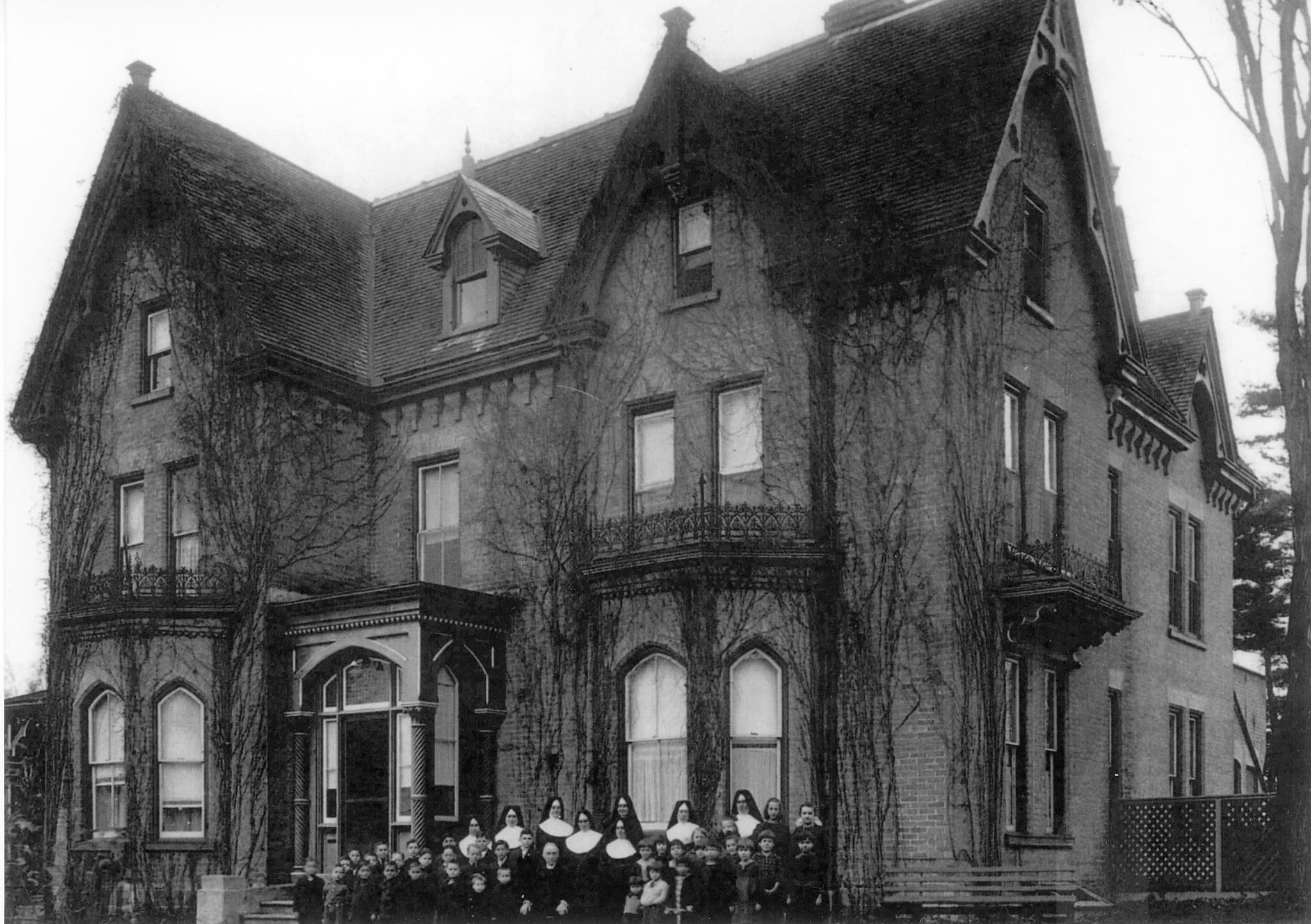 Photo of St. Vincent's Orphanage, Peterborough, Ontario with Sisters and children